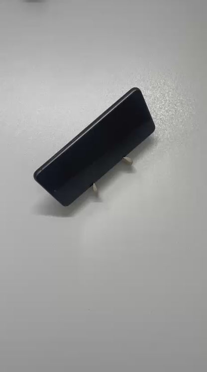 Holdy – Fidget toy aimanté et support de téléphone 2-en-1